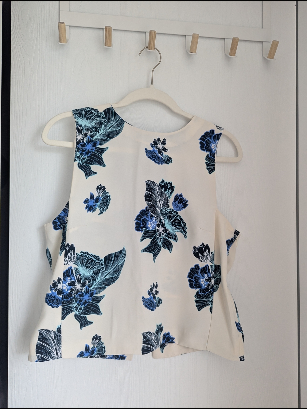 H&M Cream Sleeveless Top with Blue Floral Pattern